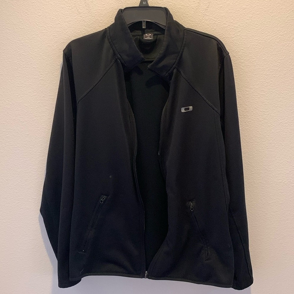 Oakley Mens full length zip nylon jacket. Size Large.